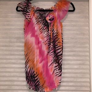 Women’s colourful off shoulder top.